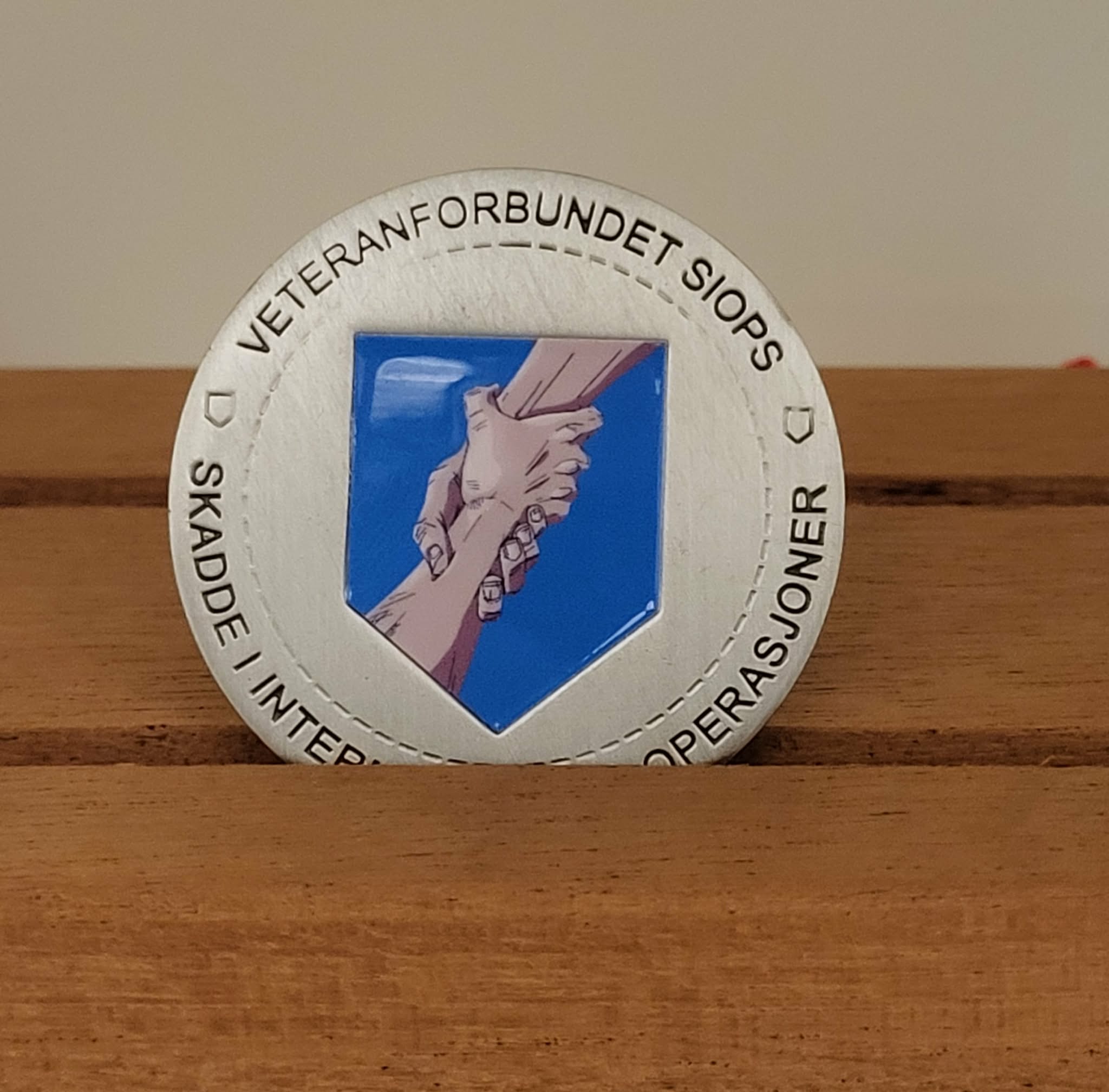 Artikkelbilde til artikkelen Utdeling av SIOPS-coin 